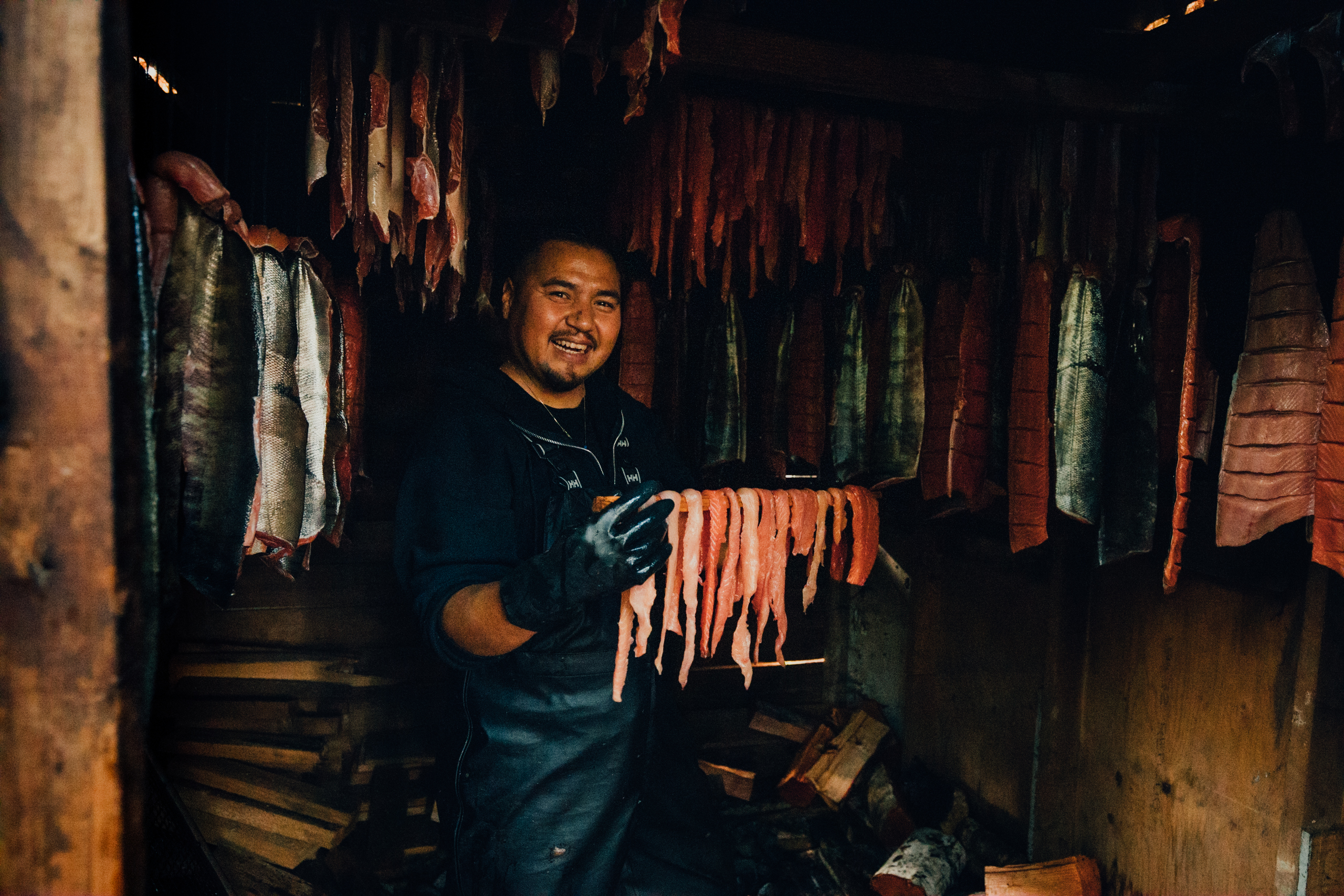 Man drying fish in Bella Bella, British Columbia