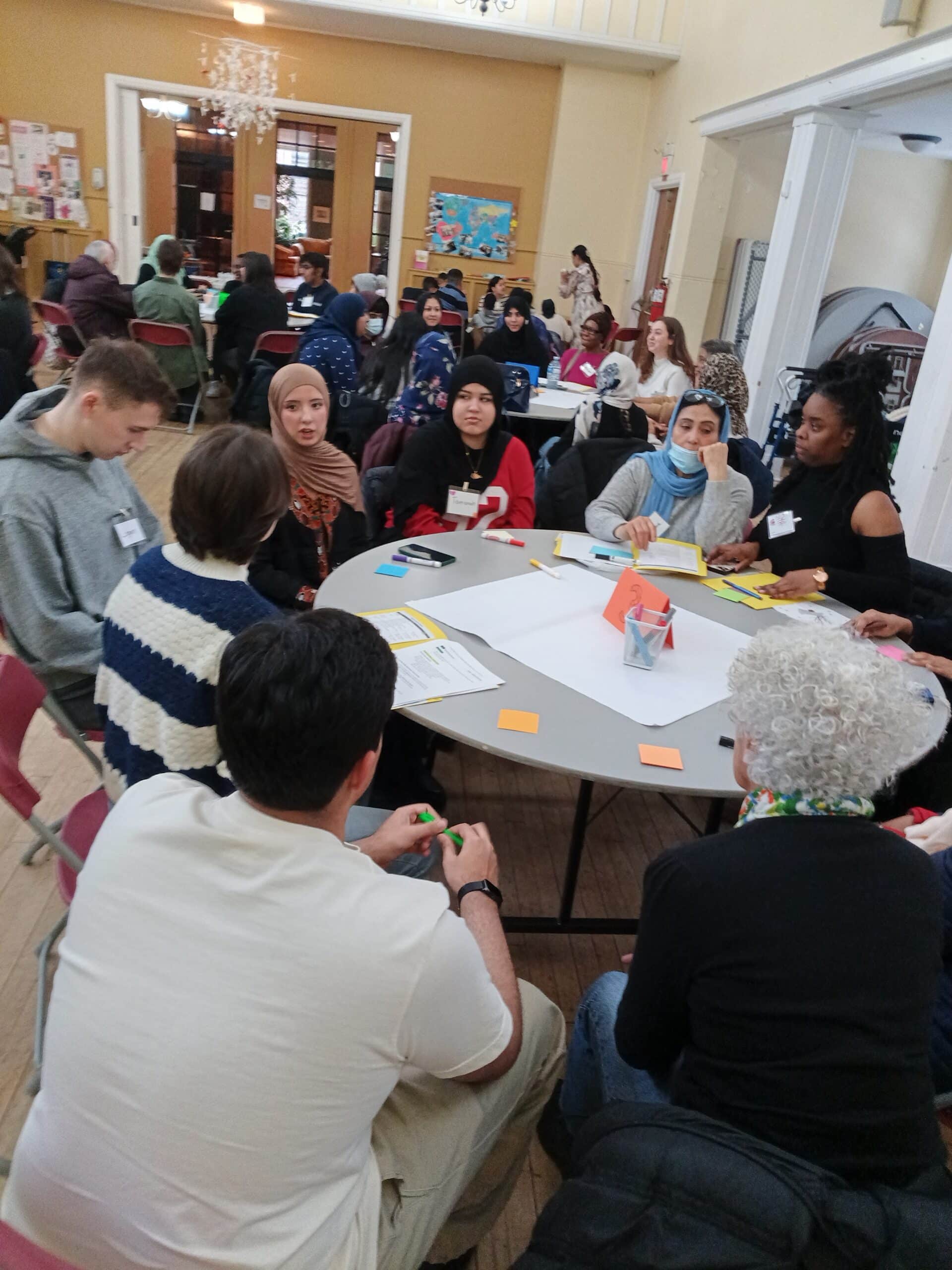 Participants gathered for a community engagement session on heat adaptations hosted by Community Resilience to Extreme Weather (CREW)