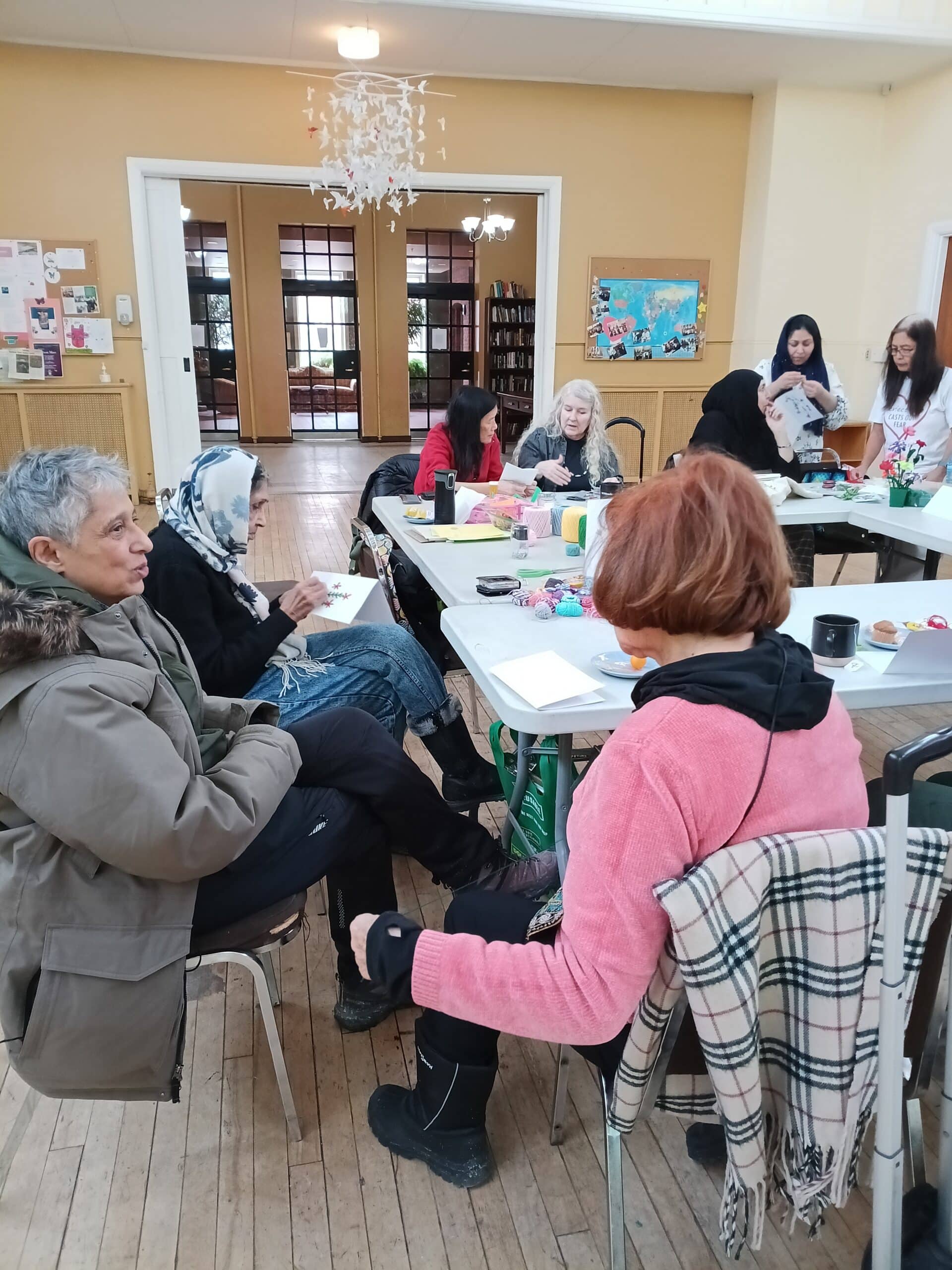 Community members gathered at the women’s weekly craft, coffee and conversation circles hosted by CREW.